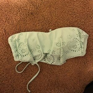 Green target swimsuit top